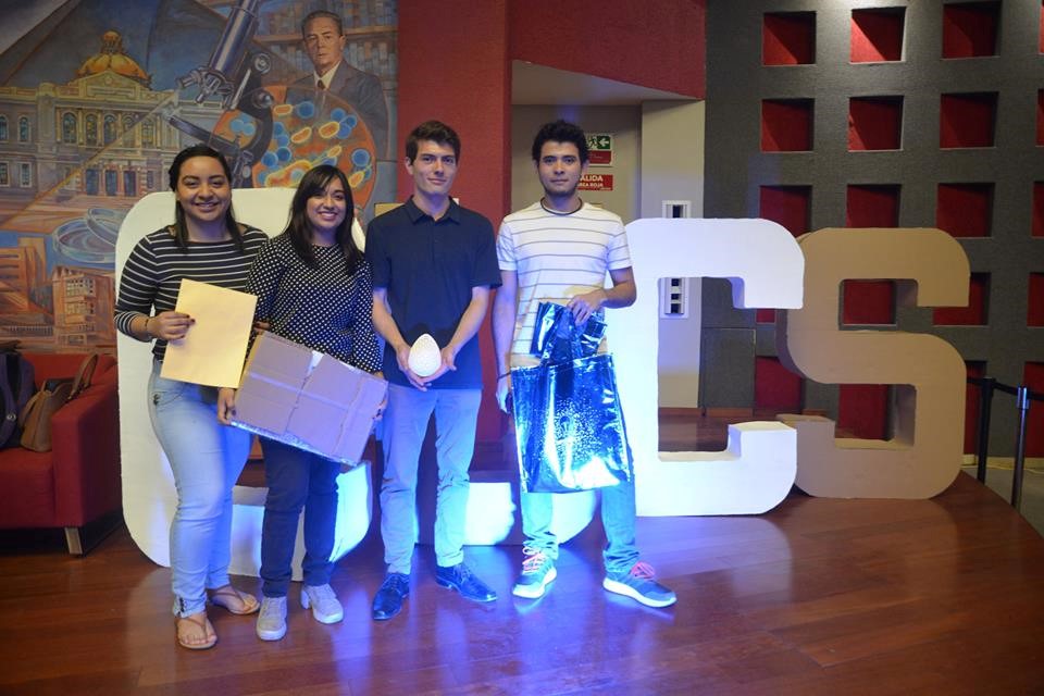  5 people, people smiling, people standing and indoor