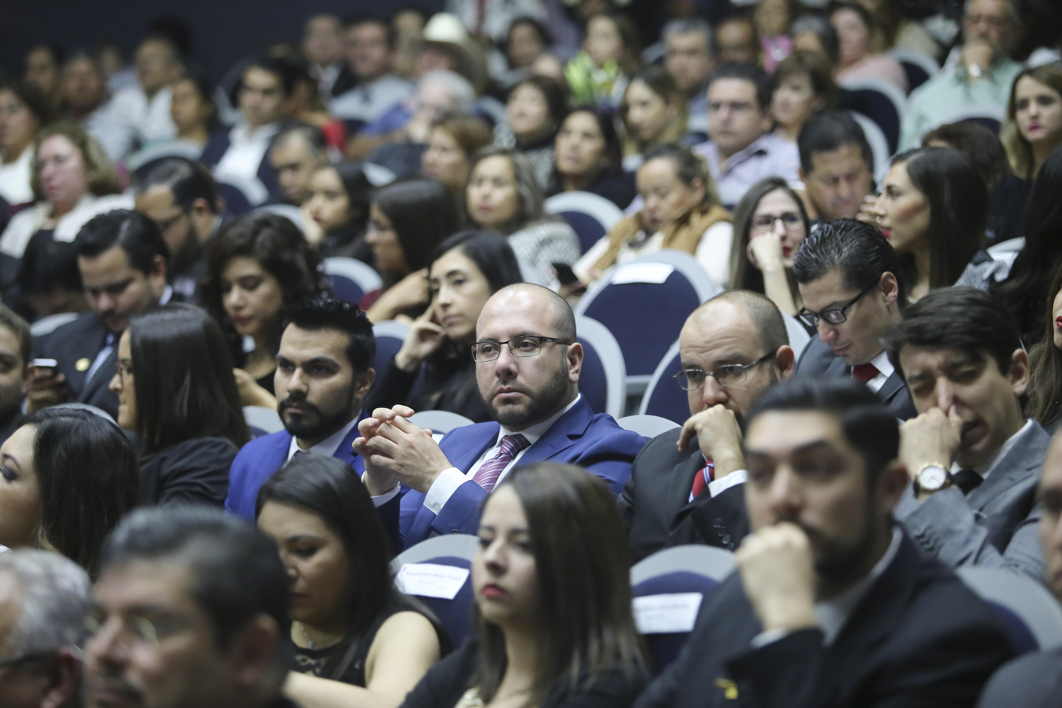 Invitados y familiares al acto académico