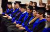 Alumnos graduados con toga y birrete