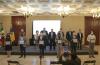 Integrantes Sala Situación exhibindo el reconocimiento en Casa Jalisco, en la fila de atrás el gobernador de jalisco y funcionarios de gobierno