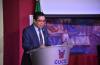Rector CUCS dando mensaje en pódium