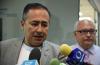 Rector del CUCS ofreciendo entrevista a la prensa